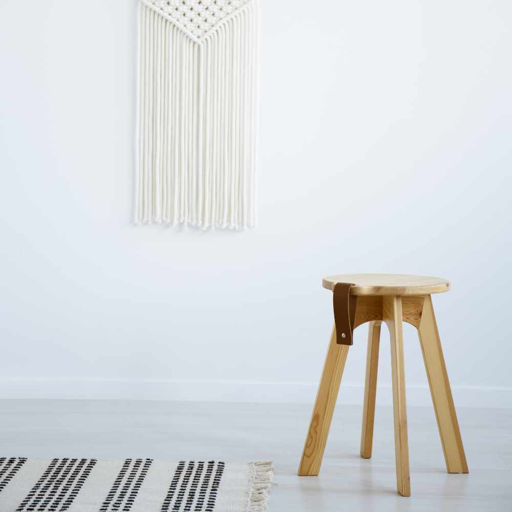 wooden-stool-and-rug-in-white-simple-living-room-i-63GYQD4.jpg